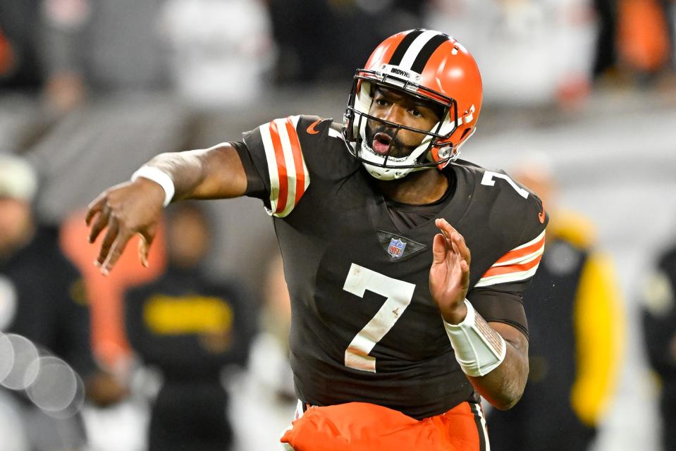 Cleveland Browns quarterback Jacoby Brissett follows through on an 11-yard touchdown pass to Amari Cooper during the first half of the team's NFL football game against the Pittsburgh Steelers in Cleveland, Thursday, Sept. 22, 2022. (AP Photo/David Richard)