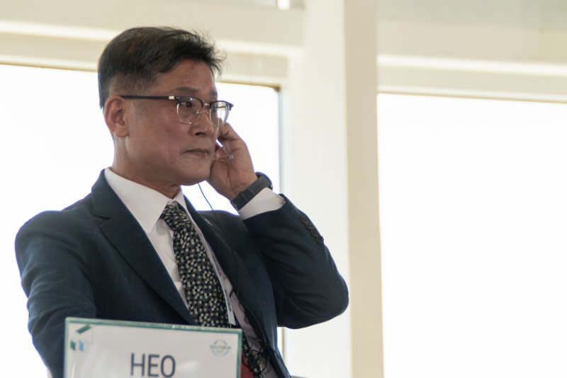 Heo Ho Joon, a senior reporter with The Hankyoreh and author of "American Involvement in the Jeju April 3 Incident," listens to a speech Wednesday, May 29, 2024, at the Jeju Forum for Peace and Prosperity at the International Convention Center Jeju, Jungmunm, Jeju Island. Heo spoke during a session at the forum dedicated to the Jeju Massacre. Photo by Darryl Coote/UPI