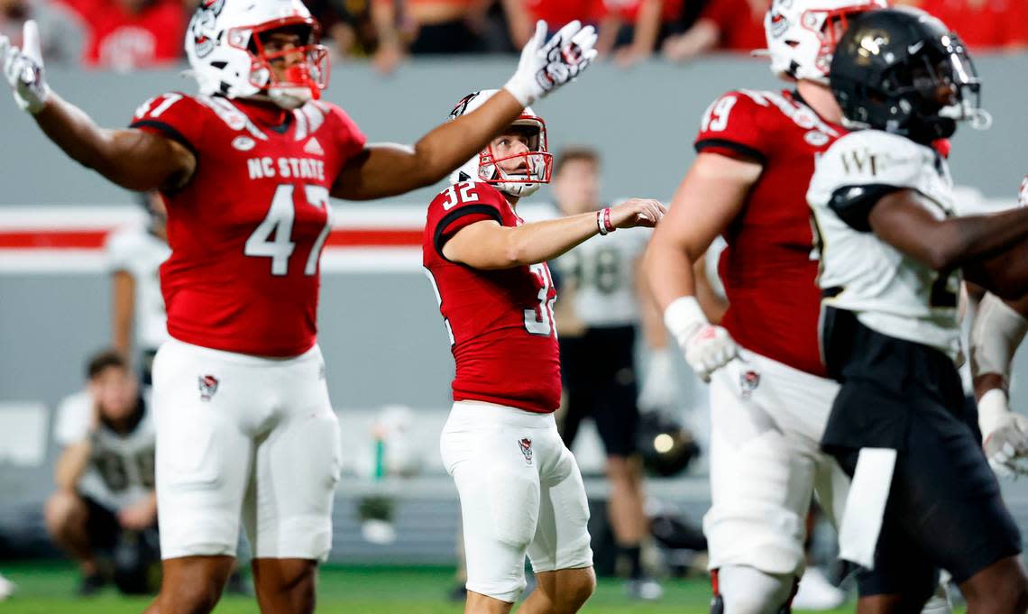 N.C. State kicker Christopher Dunn (32) watches as his 51-yard field goal sails through the uprights during the second half of N.C. State’s 30-21 victory over Wake Forest at Carter-Finley Stadium in Raleigh, N.C., Saturday, Nov. 5, 2022.