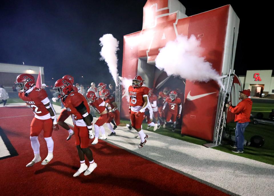 Carl Albert players take the field to play Collinsville in State Championship Playoff High School Football on Nov 17, 2023; Midwest City, Oklahoma, USA; at Carl Albert High School. Mandatory Credit: Steve Sisney-The Oklahoman