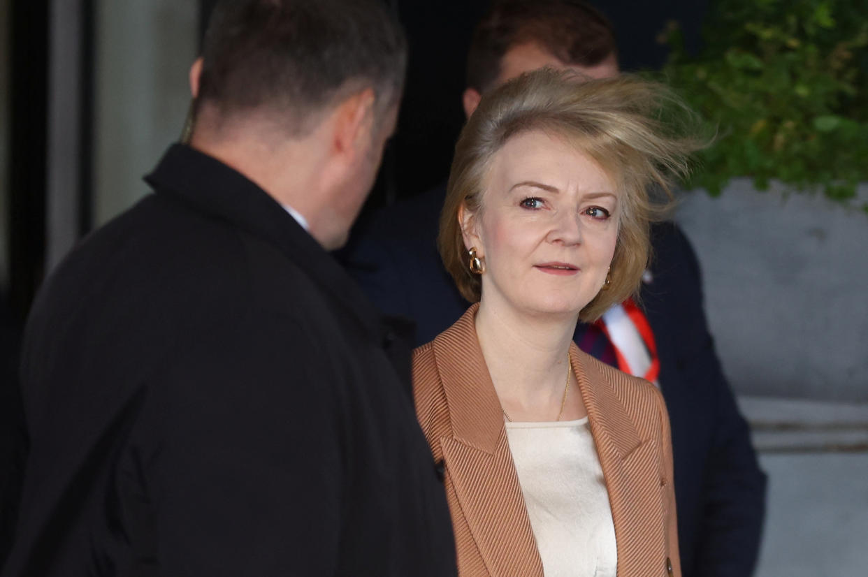 British Prime Minister Liz Truss walks outside a hotel as Britain's Conservative Party's annual conference continues, in Birmingham, Britain, October 4, 2022. REUTERS/Hannah McKay