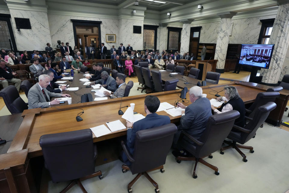 A large number of spectators watch as the Mississippi State Senate Medicaid Committee reviews a proposed Medicaid expansion bill during the committee's meeting, at the state Capitol in Jackson, Miss., Wednesday, March 27, 2024. (AP Photo/Rogelio V. Solis)