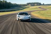 <p>There are only modest aero aids on the <a href="https://www.caranddriver.com/mclaren/600lt" rel="nofollow noopener" target="_blank" data-ylk="slk:McLaren 600LT;elm:context_link;itc:0;sec:content-canvas" class="link ">McLaren 600LT</a>—a fixed rear wing adorns its tail, a mild splitter is integrated into its nose, and side skirts are enlisted to direct airflow down its flanks. Its Pirelli P Zero Trofeo R rubber is relatively narrow with a slight stagger (225s in front, 285s out back). On paper, it's a mere sports car. On track, it's a supercar. <a class="link " href="https://www.caranddriver.com/features/a29390106/2020-mclaren-600lt-spider-lightning-lap/" rel="nofollow noopener" target="_blank" data-ylk="slk:Lap Test;elm:context_link;itc:0;sec:content-canvas">Lap Test</a></p>