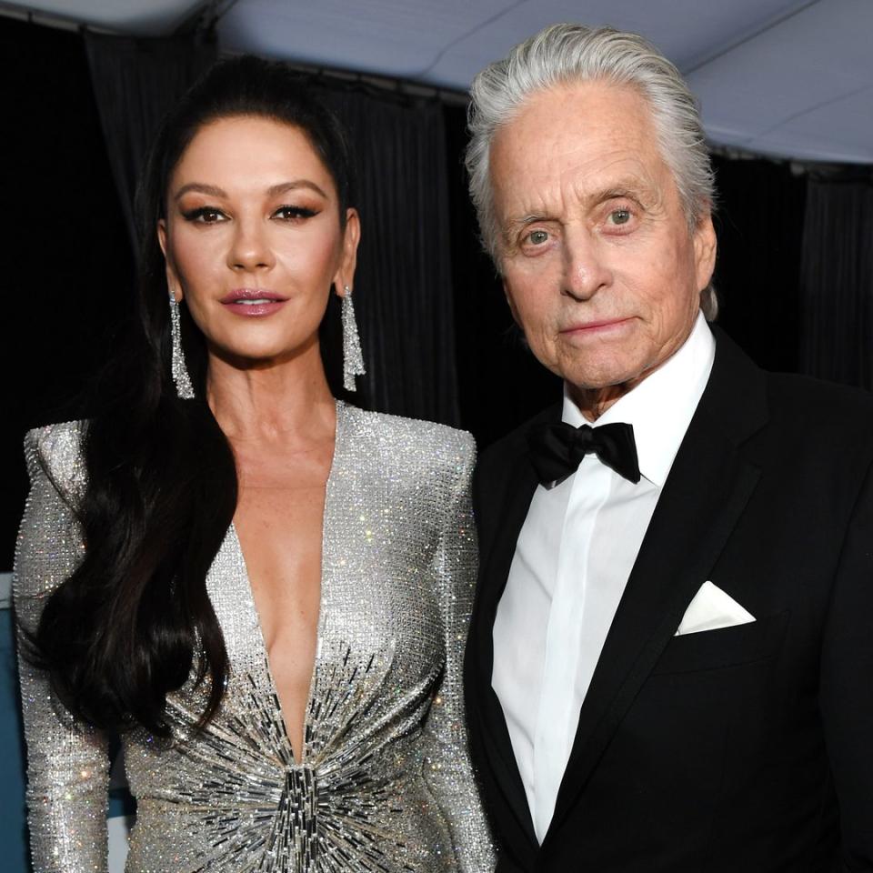 Michael Douglas twins with son Dylan in rare vacation photos with wife Catherine Zeta-Jones