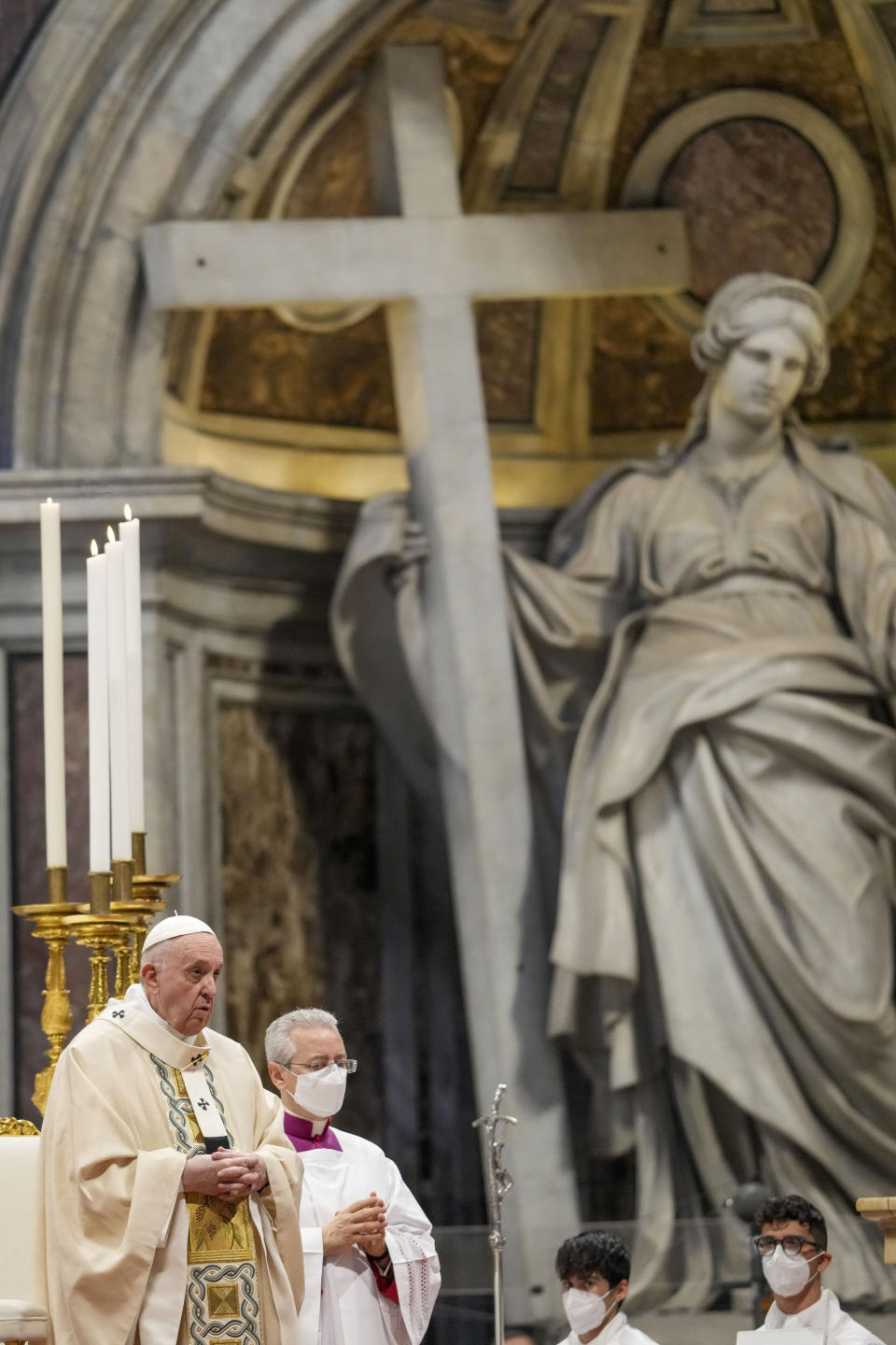 Pope Francis celebrates Mass on the occasion of the Christ the King festivity, in St. Peter's Basilica at the Vatican, Sunday, Nov. 21, 2021. (AP Photo/Andrew Medichini)