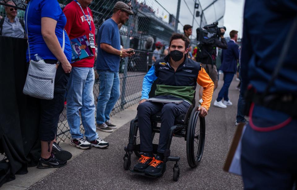 Arrow McLaren SP's Robert Wickens makes his way down pit lane Friday, May 27, 2022, during Carb Day at Indianapolis Motor Speedway.