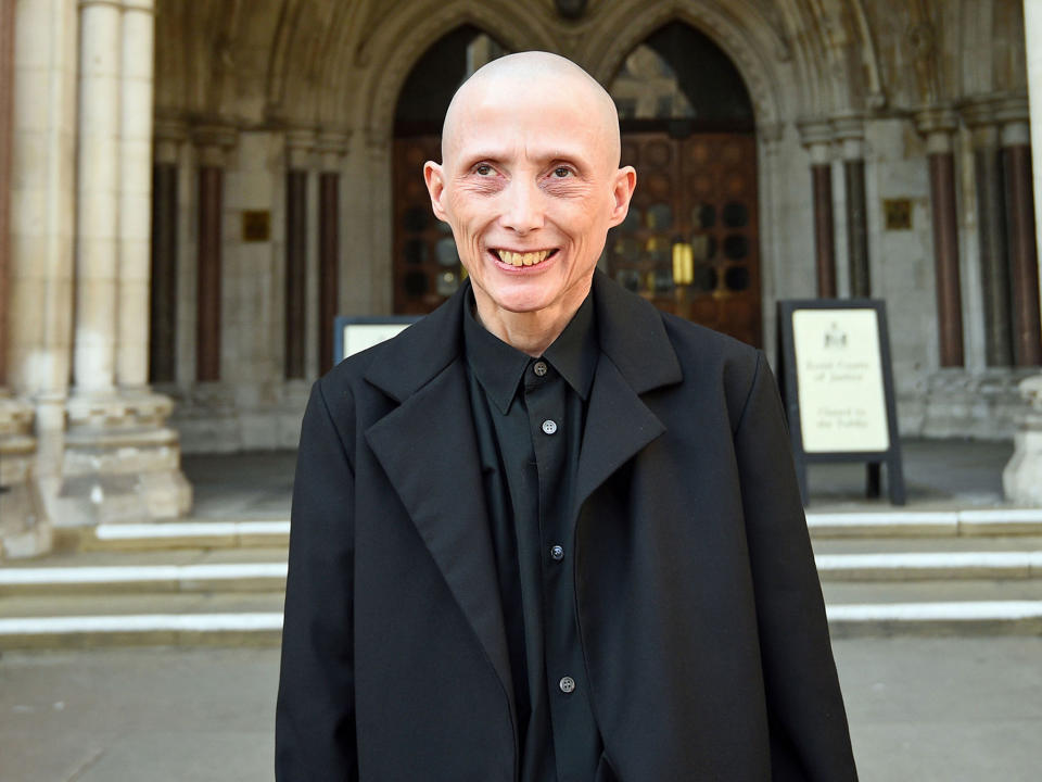 Christie Elan-Cane, who is campaigning for gender-neutral passports, outside the Royal Courts of Justice in London: PA