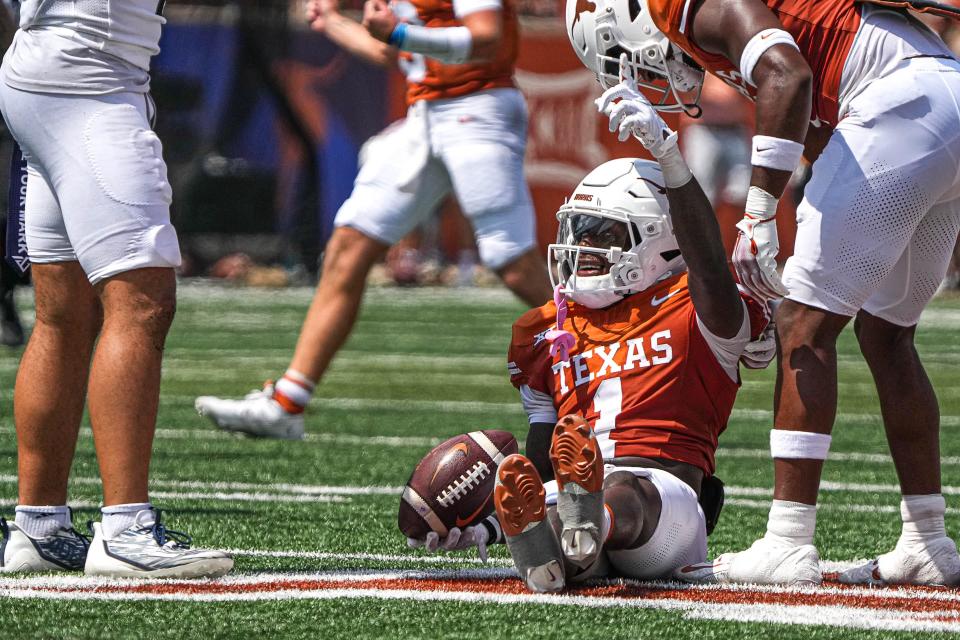 Texas wideout Xavier Worthy caught seven passes for 90 yards Saturday, but he and quarterback Quinn Ewers couldn't connect on any deep attempts.