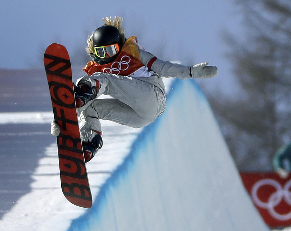 FILE- In this Feb. 13, 2018, file photo, Chloe Kim, of the United States, jumps during the women's halfpipe finals at Phoenix Snow Park at the 2018 Winter Olympics in Pyeongchang, South Korea. Chloe Kim took some time off to heal her body and broaden her mind. Mission(s) accomplished, and now that she's back at her day job — best female athlete in the halfpipe — it looks as though she never left. Now 20 and with a year at Princeton under her belt, the Olympic champion is in the lineup for the Winter X Games, going for her fifth gold medal on the superpipe in Aspen on Saturday night, Jan. 30, 2021. (AP Photo/Gregory Bull, File)