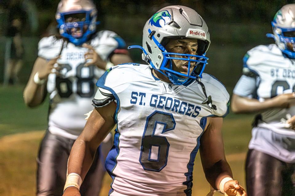 Running back Camron Montgomery rushes for 144 yards on 22 carries in St. Georges' 20-9 victory over Saint Mark's on Friday night.