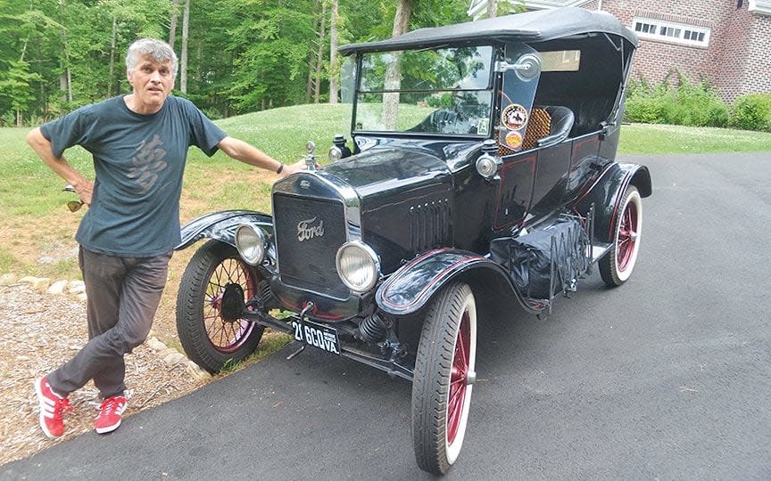 Tim Moore with Mike, his beloved Ford Model T - Courtesy of Tim Moore