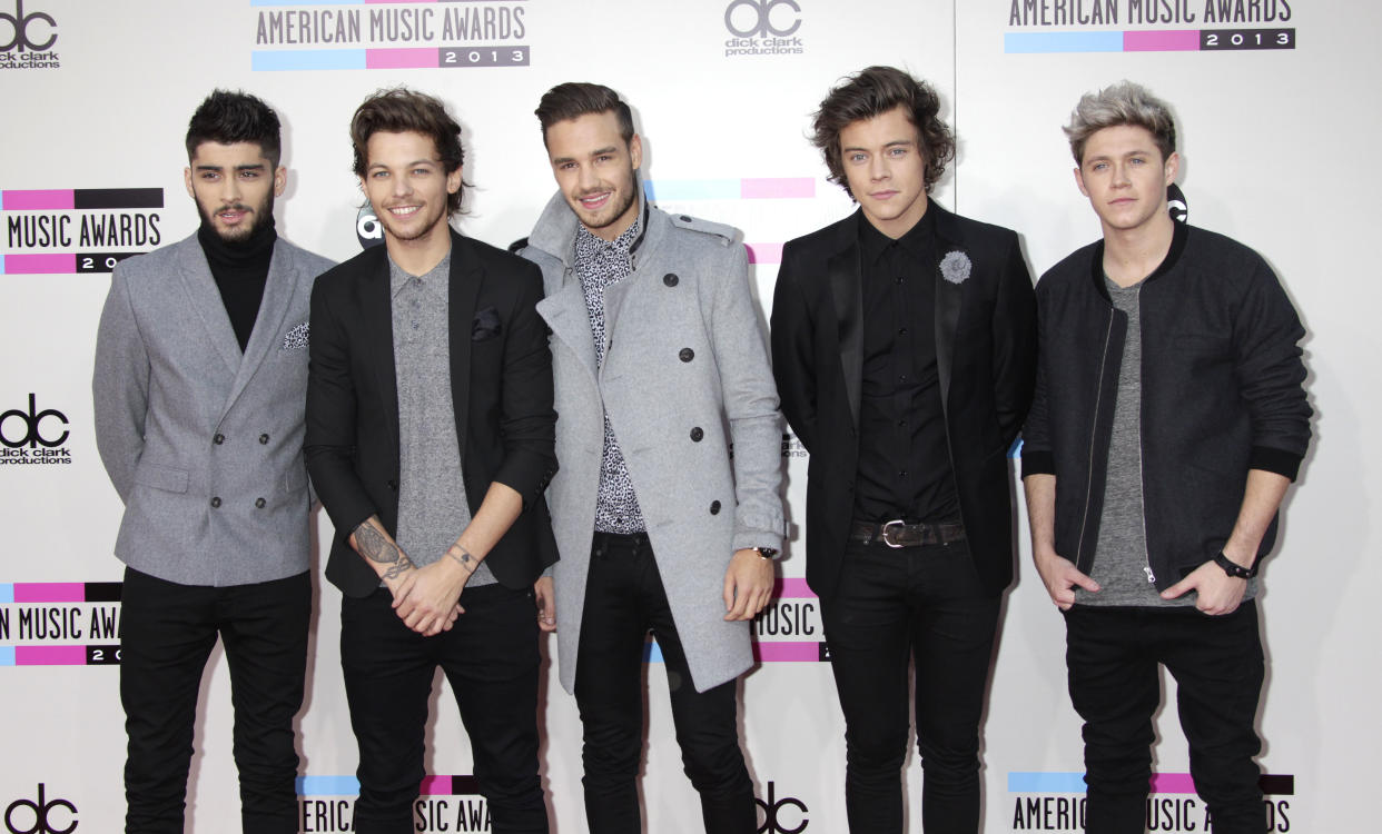 Zayn Malik, Louis Tomlinson, Liam Payne, Harry Styles, and Niall Horan of One Direction arrive at the American Music Awards on November 24, 2013 in Los Angeles, California. Francis Specker /Landov