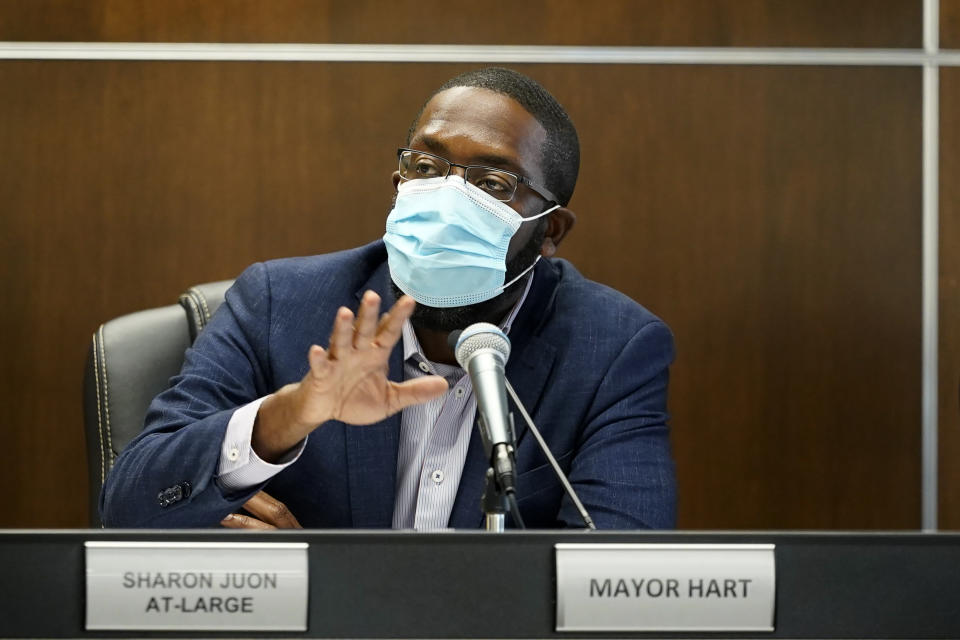 Waterloo Mayor Quentin Hart speaks during a City Council meeting, Tuesday, Sept. 7, 2021, in Waterloo, Iowa. Joel Fitzgerald, the first Black police chief in Waterloo, is facing intense opposition from some current and former officers as he works with city leaders to reform the department, including the removal of its longtime insignia that resembles a Ku Klux Klan dragon. Several of the changes the department has made under Fitzgerald have won praise from Hart, most city councilors and some community leaders — while angering the police union, some retired officers and conservatives. (AP Photo/Charlie Neibergall)