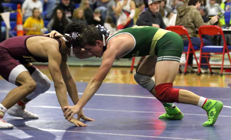 Ithaca's Daniel Parker, left, beat Vestal's Braden McMahon in the 145-pound final at the Southern Tier Athletic Conference Wrestling Tournament on Jan. 21, 2023 at Owego Free Academy.