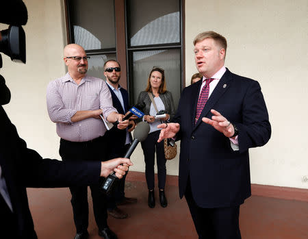 U.S. Navy SEAL Special Operations Chief Edward Gallagher's defense attorney, Timothy Parlatore, speaks with reporters in San Diego at a pre-trial hearing for Gallagher who was charged with war crimes in Iraq, in San Diego, U.S. May 22, 2019. REUTERS/Earnie Grafton