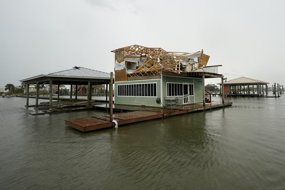 A damaged home is shown Friday, Aug. 28, 2020, in Hackberry, La., after Hurricane Laura move through the area Thursday. (AP Photo/David J. Phillip)