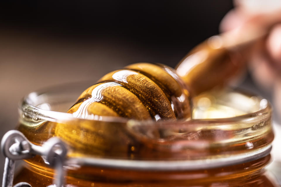 Closeup of a honey jar