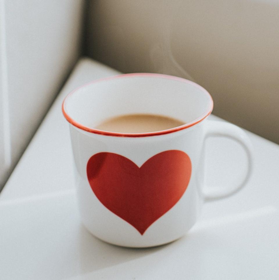 A cup of tea in a heart mug