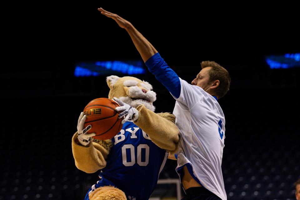 Kenny Cox defends Cosmo on a shot during a basketball game at Media Madness, an event hosted by the BYU men’s basketball program, at the Marriott Center in Provo on Monday, Oct. 9, 2023. | Megan Nielsen, Deseret News