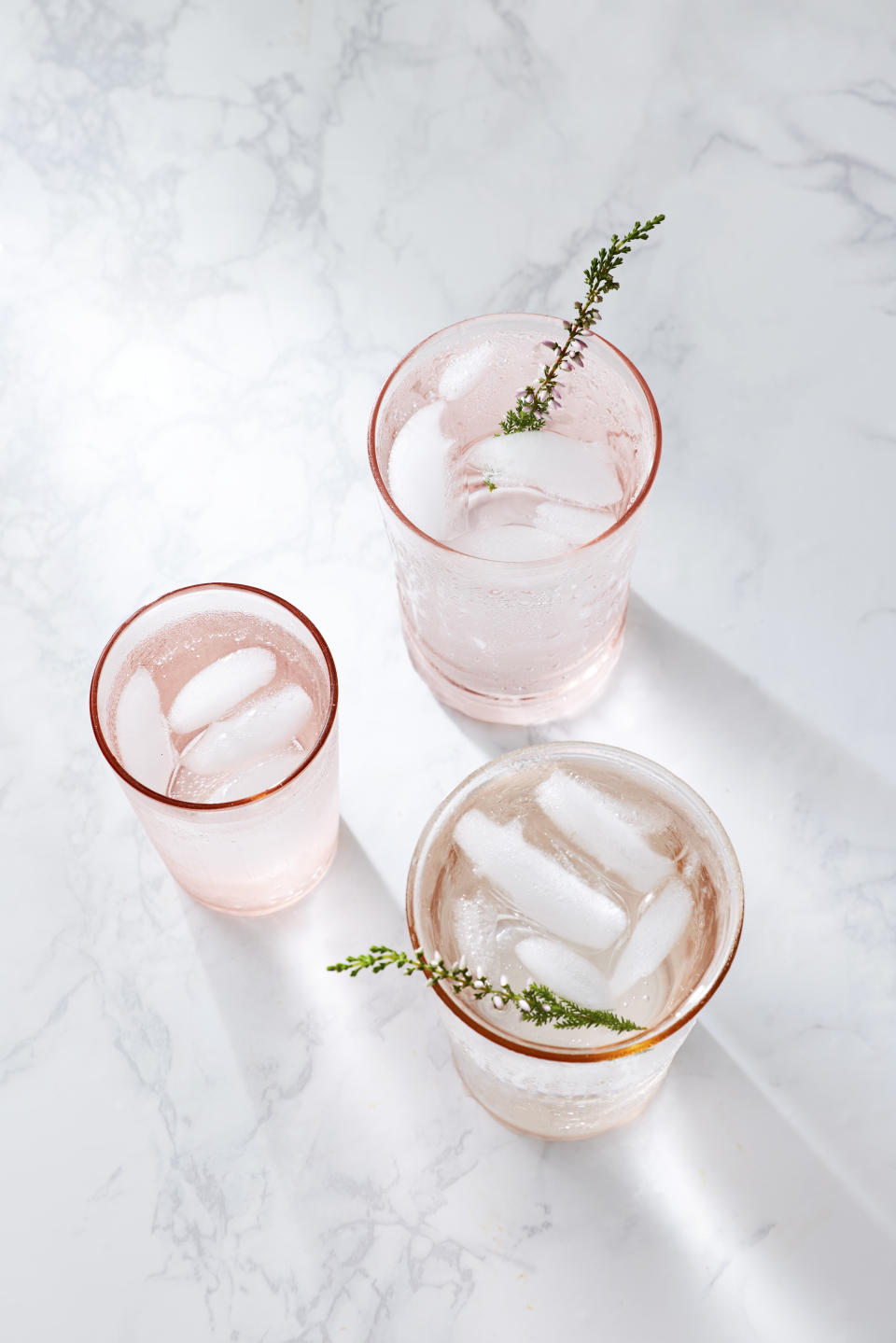 Thyme and ice in rosé is a simple and stylish hack to bring out the taste of the wine. Photo: Getty