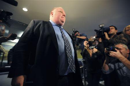 Toronto Mayor Rob Ford leaves his City Hall office to return to a city council meeting after a brief recess in Toronto November 15, 2013. REUTERS/Jon Blacker