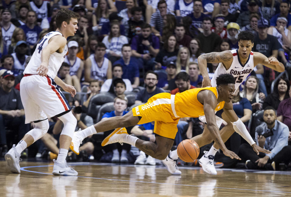 Tennessee's Admiral Schofield (5) loses the ball against Gonzaga's Corey Kispert (24) and Brandon Clarke (15) during the first half of an NCAA college basketball game Sunday, Dec. 9, 2018, in Phoenix. (AP Photo/Darryl Webb)