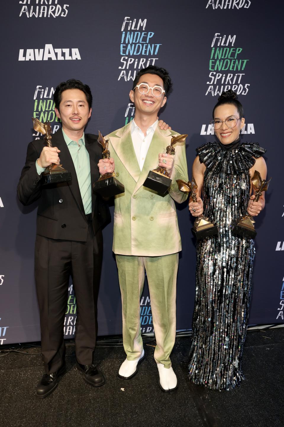 From left, Steven Yeun, Lee Sung Jin, and Ali Wong are the winners of best new scripted series for "Beef" at the 2024 Film Independent Spirit Awards on Sunday in Santa Monica, Calif.