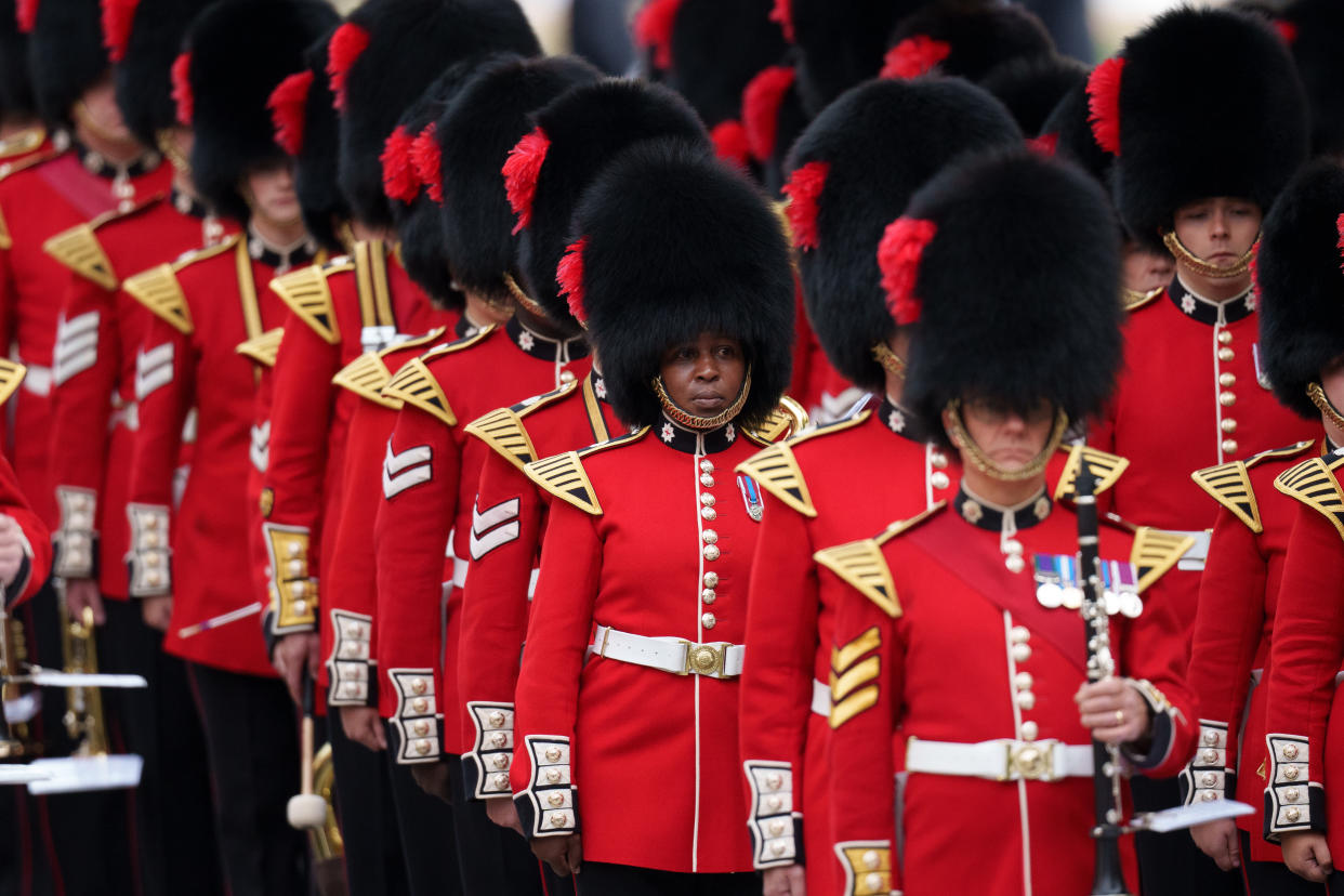 LONDON, ENGLAND - SEPTEMBER 19: Coldstream Guards ahead of the State Funeral of Queen Elizabeth II on September 19, 2022 in London, England. Elizabeth Alexandra Mary Windsor was born in Bruton Street, Mayfair, London on 21 April 1926. She married Prince Philip in 1947 and ascended the throne of the United Kingdom and Commonwealth on 6 February 1952 after the death of her Father, King George VI. Queen Elizabeth II died at Balmoral Castle in Scotland on September 8, 2022, and is succeeded by her eldest son, King Charles III. . (Photo by Christopher Furlong/Getty Images)