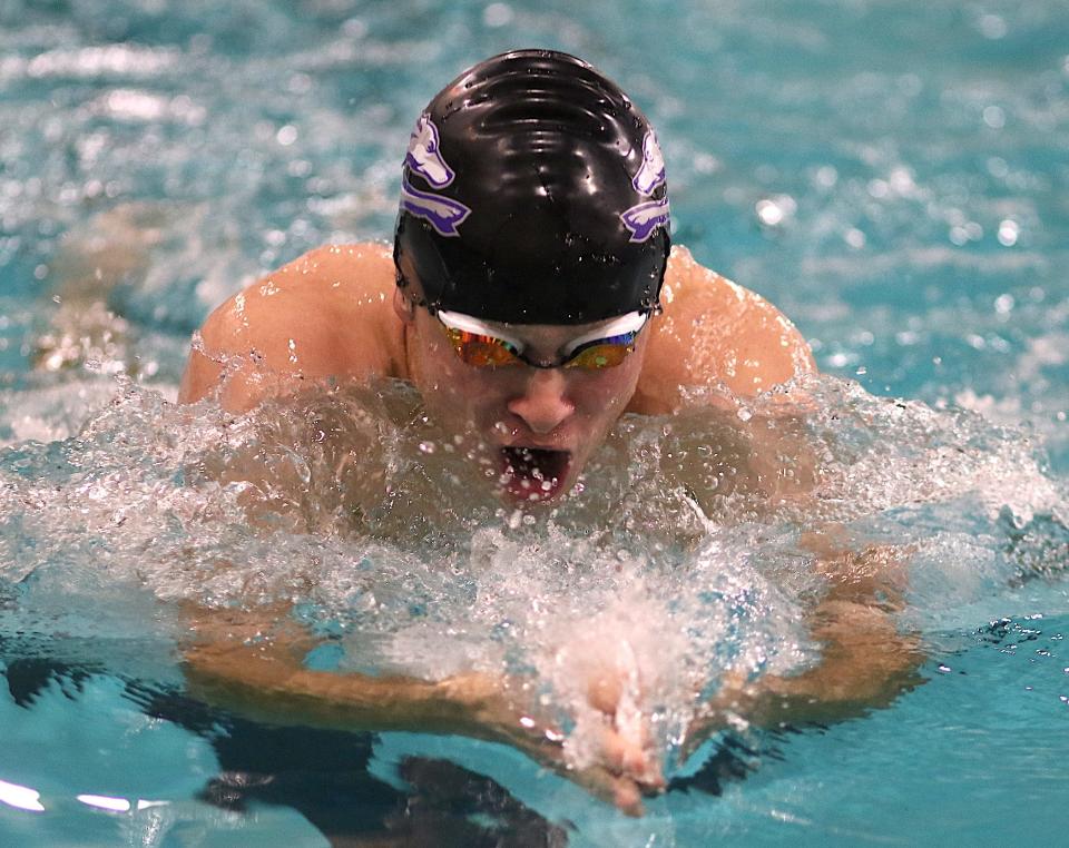 Burlington’s Will Davidson swims in the 100-yard breaststroke against United Township Friday in Burlington.