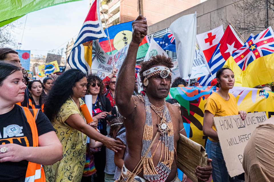 A man wearing the traditional dress of the Solomon Islands march on September 20, 2019 in Melbourne, Australia. (Photo: Asanka Ratnayake/Getty Images)