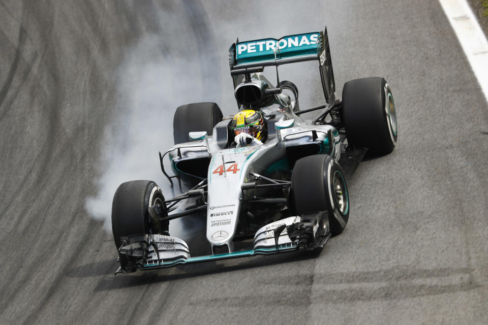 Smokin’: Lewis Hamilton adds a bit of aroma to the air as he locks up a wheel at Interlagos in 2016