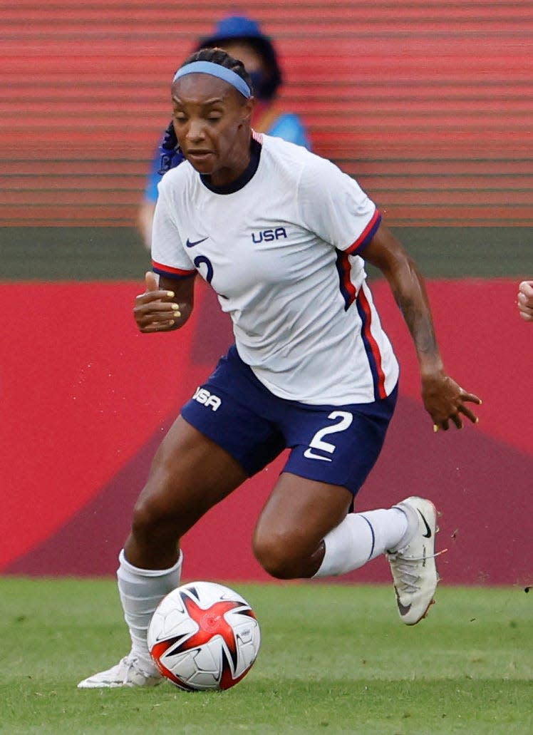 Crystal Dunn will start for the USWNT during the 2023 World Cup.  She's been a mainstay on the roster for years.  Here, she chases the ball with Team Canada midfielder Jessie Fleming (17) during the semifinal of the Tokyo 2020 Olympic Summer Games at Ibaraki Kashima Stadium.