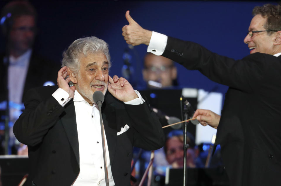 Opera star Placido Domingo performs during a concert in Szeged, Hungary, Wednesday, Aug. 28, 2019. Domingo continued his calendar of European engagements unabated despite allegations of sexual harassment, appearing Wednesday at a concert in southern Hungary to inaugurate a sports complex for a local Catholic diocese.(AP Photo/Laszlo Balogh)