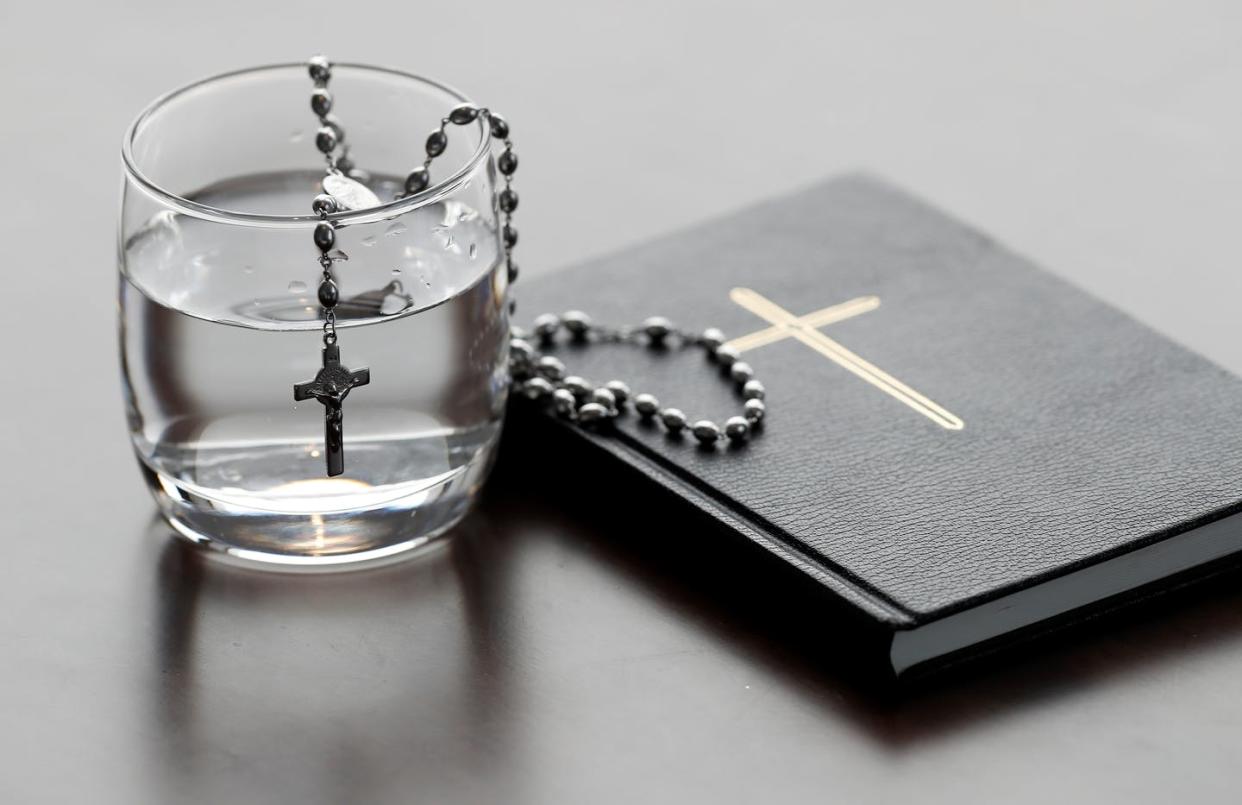 Lent is a period of fasting and reflection for many Chistians. <a href="https://www.gettyimages.com/detail/news-photo/rosary-glass-of-water-and-holy-bible-during-lent-a-solemn-news-photo/1265207199?adppopup=true" rel="nofollow noopener" target="_blank" data-ylk="slk:Pascal Deloche/Godong/Universal Images Group via Getty Images;elm:context_link;itc:0;sec:content-canvas" class="link ">Pascal Deloche/Godong/Universal Images Group via Getty Images</a>