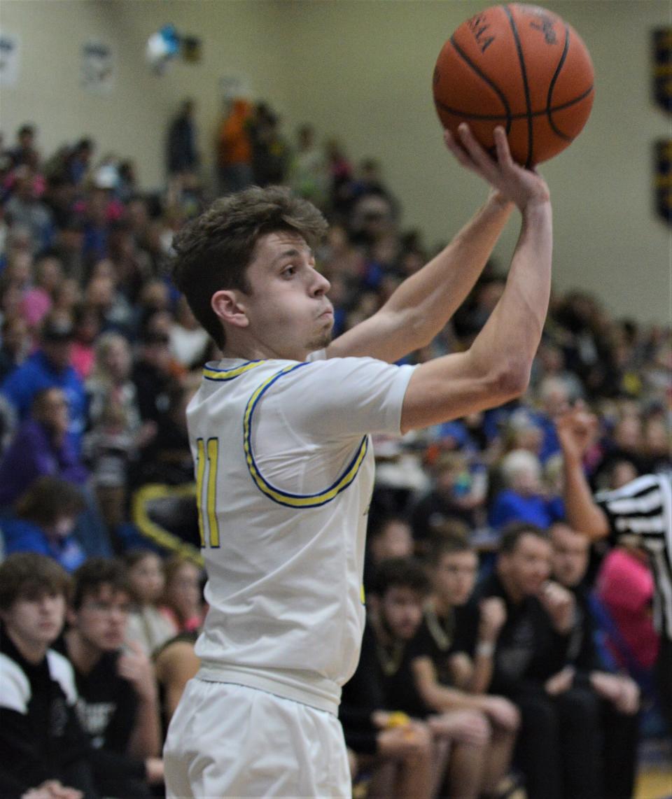 Maysville's Cole Roberts shoots a corner 3 during Friday's 88-67 win over River View.