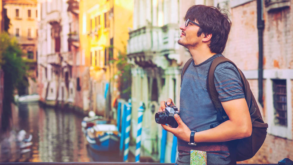 Young man travelling in Venice, Italy.