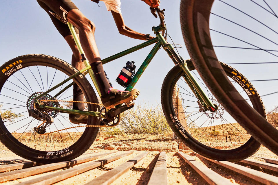 Onguza Rooster custom steel hardtail mountain bike handmade in Namibia, Africa - riding cattle grate