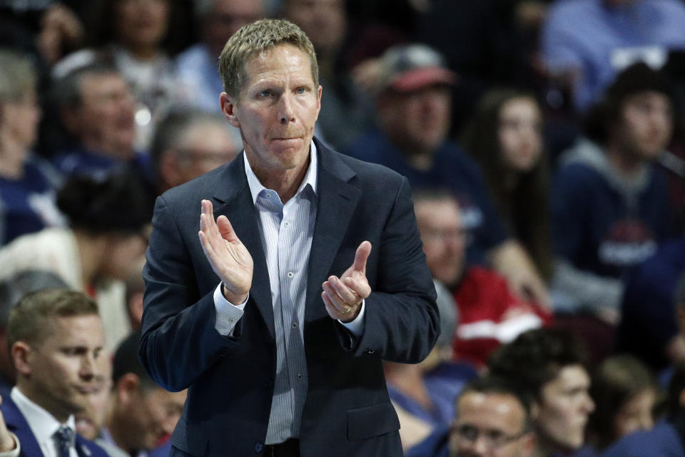 FILE - In this March 10, 2020, file photo, Gonzaga head coach Mark Few motions toward the court in the second half of an NCAA college basketball game against Saint Mary's in the final of the West Coast Conference men's tournament in Las Vegas. Gonzaga and Baylor remained Nos. 1-2 in the first Associated Press men’s college basketball poll of the regular season released Monday, Nov. 30, 2020. (AP Photo/John Locher, File)