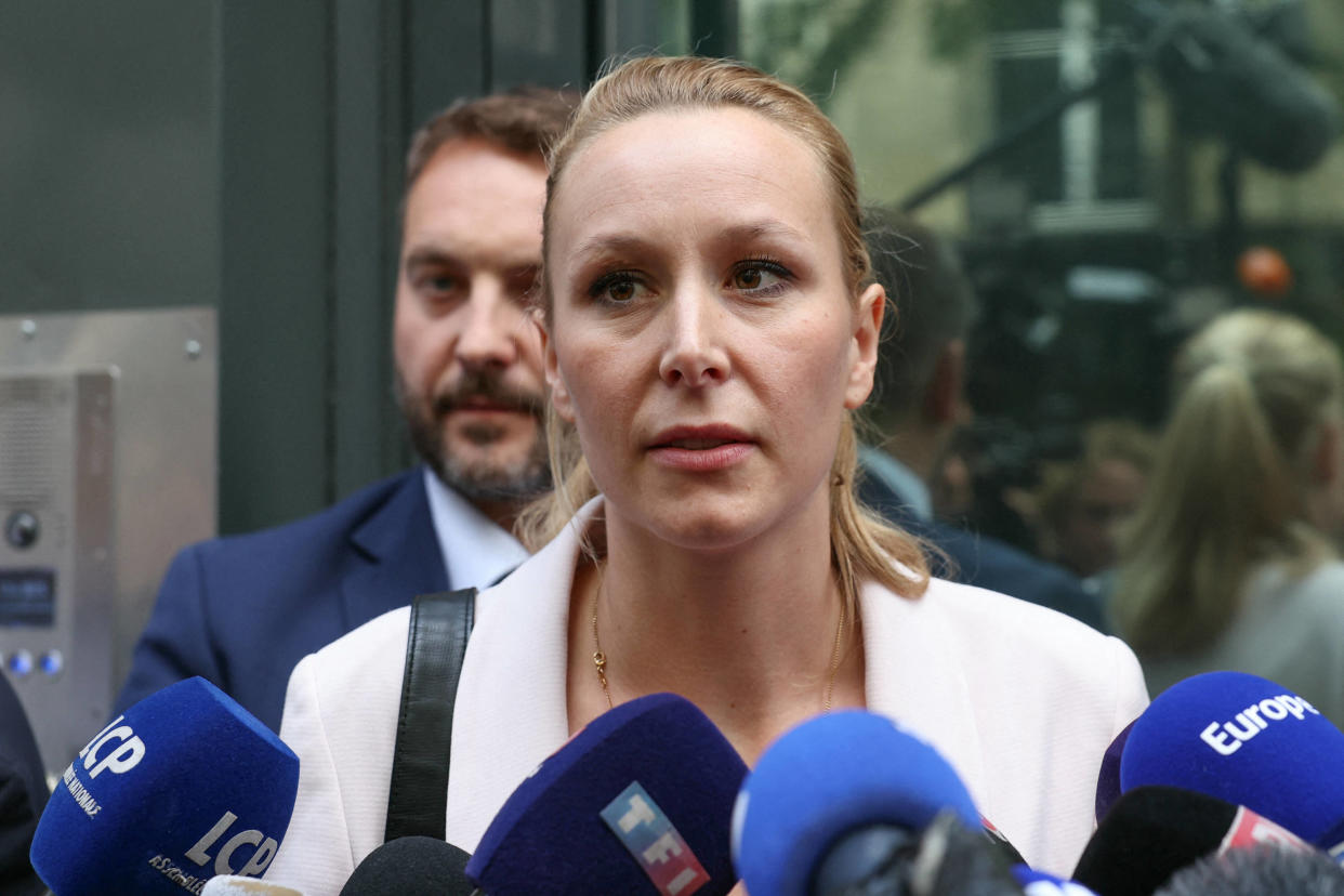 French far-right Reconquete party lead candidate Marion Marechal speaks to media representatives outside the Rassemblement National (RN) party's headquarters in Paris on June 10, 2024, a day after the European Parliament elections. (Photo by Alain JOCARD / AFP)