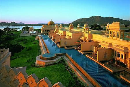 <b>No. 9 Oberoi Udaivilas, Udaipur, India. Score: 95.76</b> Built on the former hunting grounds of maharajas, the Oberoi Udaivilas sits gracefully on its own island near Udaipur. Upon arrival, you’ll be met at the airport by a car and driver, guided onto a private boat, then ferried across Lake Pichola and into the gardens and fountains of the Udaivilas estate. Book one of nine Premier rooms for a private pool, terrace, and views of wildlife including peacocks, spotted deer, and wild boar. Then wander through the on-site Bada Mahal, an 18th-century former palace with delicate frescoes. Come back to the lakeside property a second time to receive traditional mirror-work coasters or jewelry boxes - departure gifts given to repeat visitors.