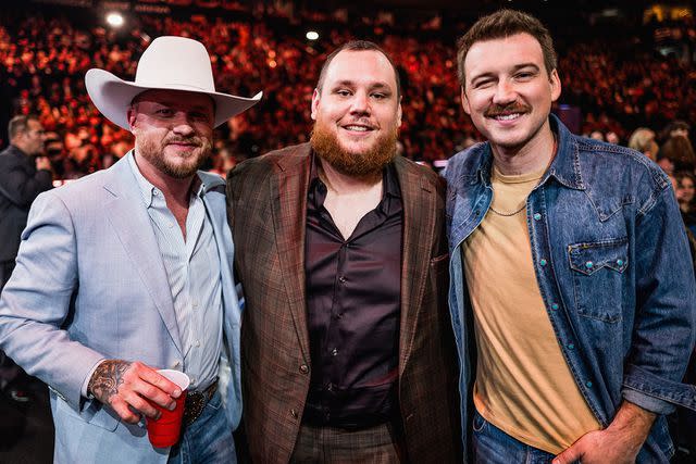 <p>John Shearer/Getty Images for CMA</p> Cody Johnson, Luke Combs and Morgan Wallen at the CMA Awards at Bridgestone Arena on Nov. 8, 2023 in Nashville