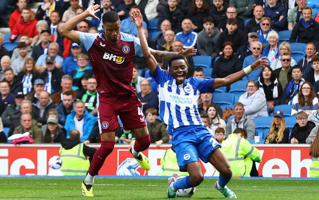Aston Villa's Ezri Konsa concedes a penalty against Brighton & Hove Albion's Simon Adingra