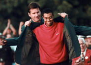 <p>Masters champion Tiger Woods receives his Green Jacket from last year’s winner Nick Faldo, rear, at the Augusta National Golf Club in Augusta, Ga., Sunday, April 13, 1997. (AP Photo/ Dave Martin) </p>