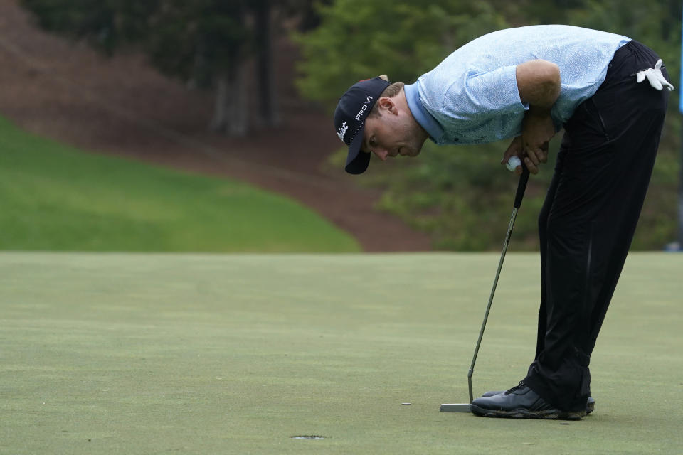 Russell Henley lines up a putt on the 18th hole during the first round of the Wyndham Championship golf tournament in Greensboro, N.C., Thursday, Aug. 3, 2023. (AP Photo/Chuck Burton)