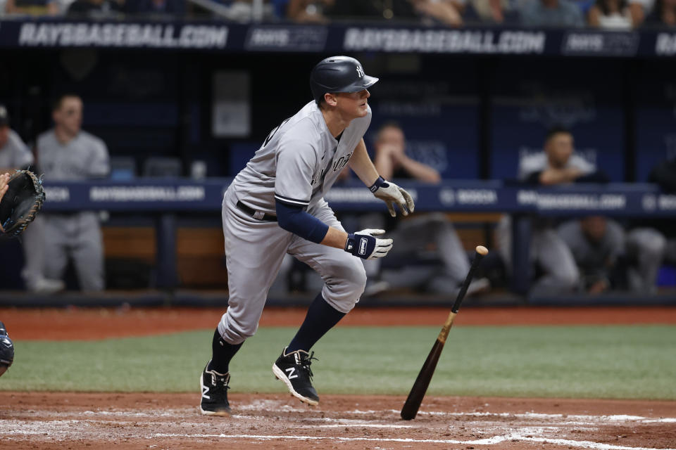 New York Yankees' DJ LeMahieu watches the ball after hitting a single against the Tampa Bay Rays during the sixth inning of a baseball game Saturday, Aug. 26, 2023 in St. Petersburg, Fla. (AP Photo/Scott Audette)