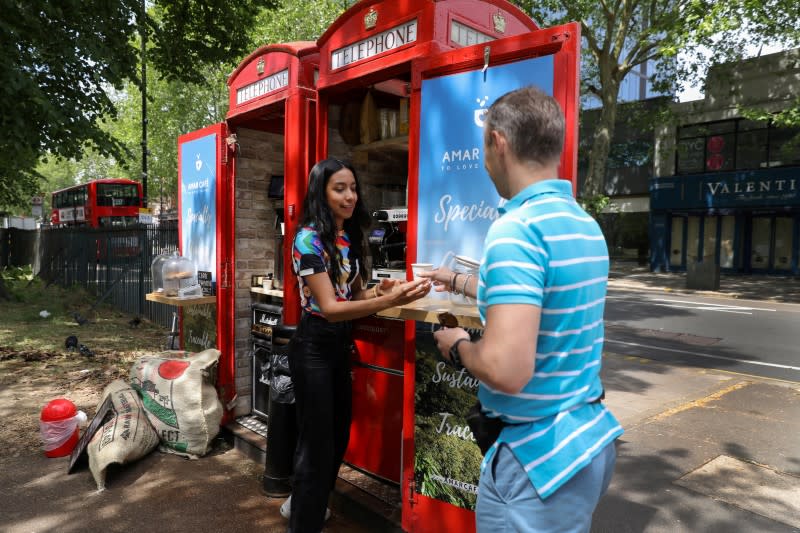 Converted telephone box operates as a take-way coffee shop