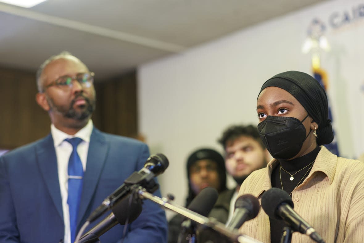 Aram Wedatalla, a Hamline University senior and the president of Muslim Student Association (MSA), speaks during a news conference at CAIR-MN office, Wednesday, Jan. 11, 2023, in Minneapolis. A Hamline University lecturer showed a painting of the Prophet Muhammad and Wedatalla was one of the students in the class when the image was displayed. (Kerem Yücel/Minnesota Public Radio via AP)