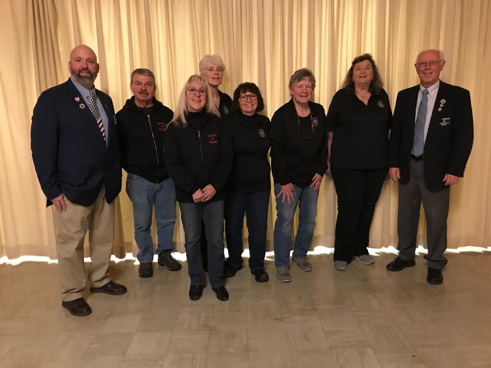 From left to right are Matthew Sanborn, Exalted Ruler, Rochester Elks; Vouchers for Veterans volunteers: Alan Brock, Ann French (front), Christine Hounsell (back), Dolores Booth, Dolly Burnell, Jeanne Grover, President, Norm Gervais, Past Exalted Ruler, Lodge Secretary and ENF Chair, Rochester Elks.
