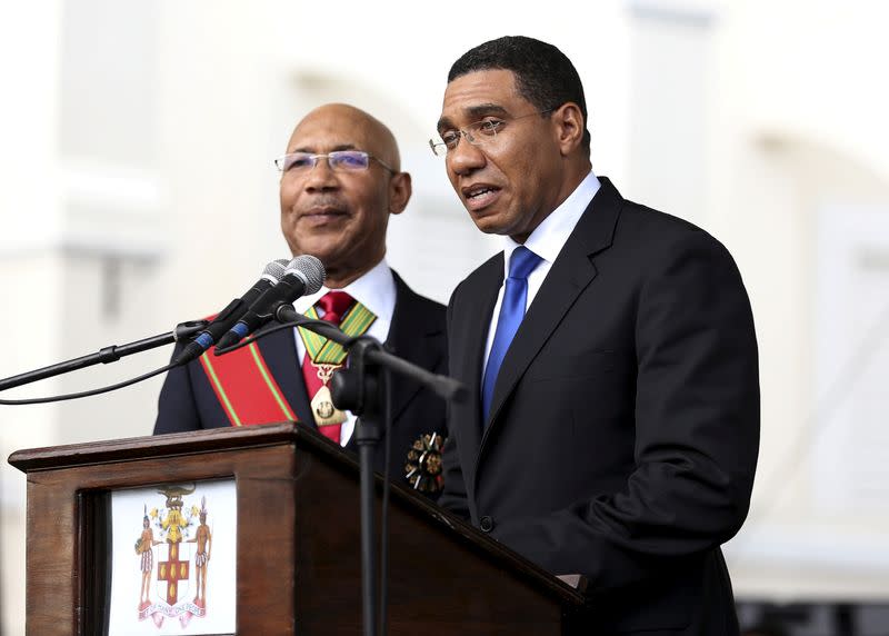 FILE PHOTO: Jamaica's Prime Minister Andrew Holness addresses the audience next to Jamaica's Governor-General Sir Patrick Allen during his swearing-in ceremony in Kingston