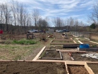 The Somersworth Community garden benefits from new raised beds thanks to the hard work of Home Depot volunteers.